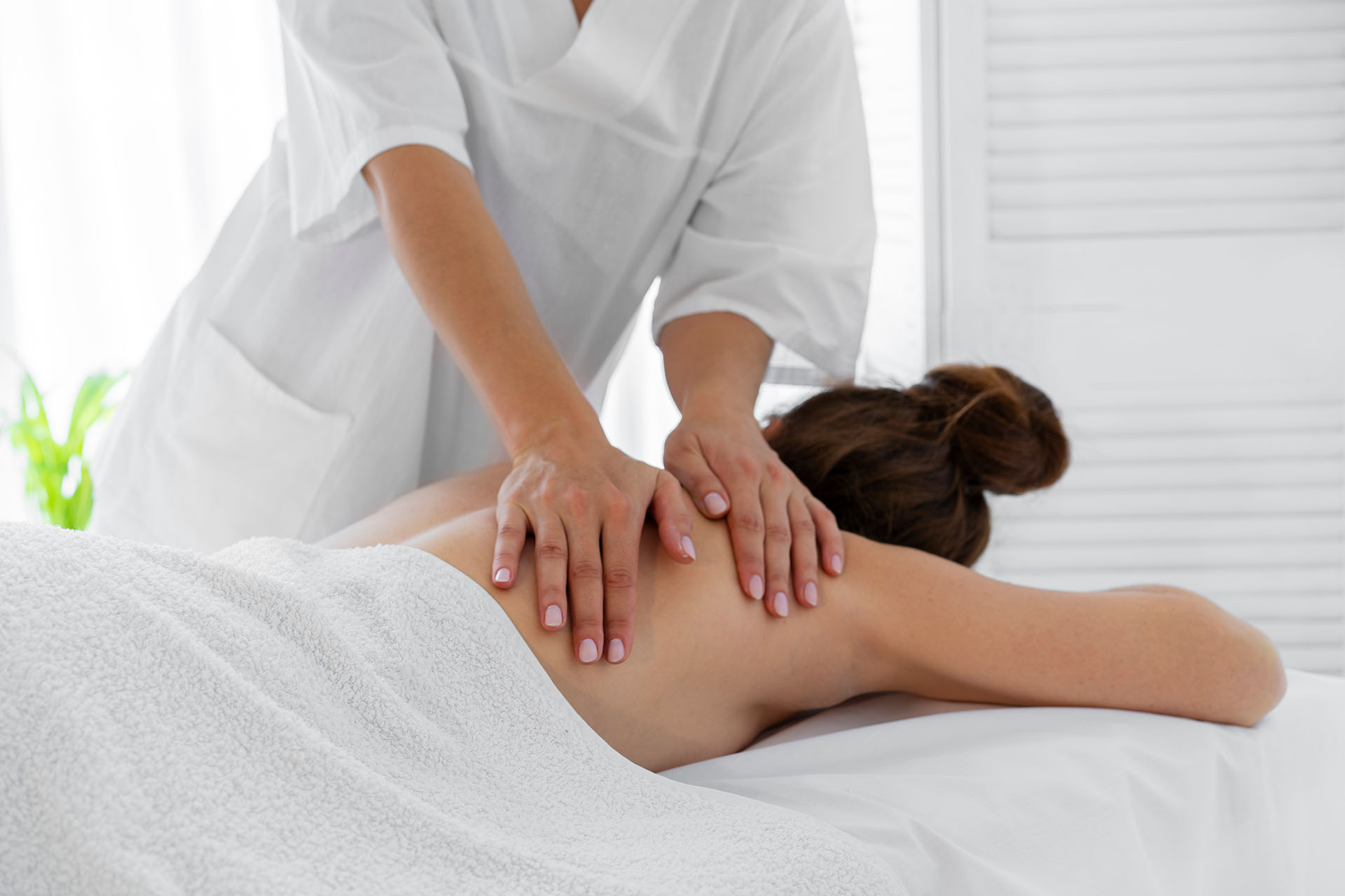 woman-spending-time-spa-getting-relaxing-massage